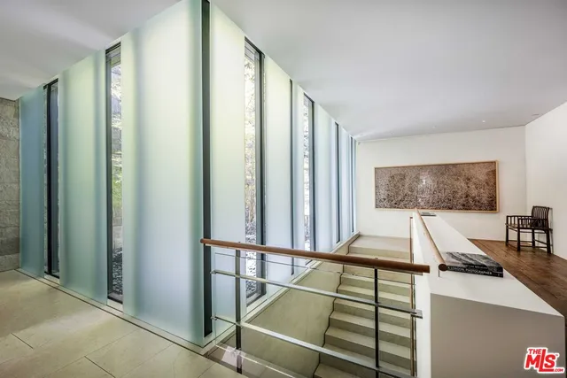 a swimming pool with outdoor seating and yard