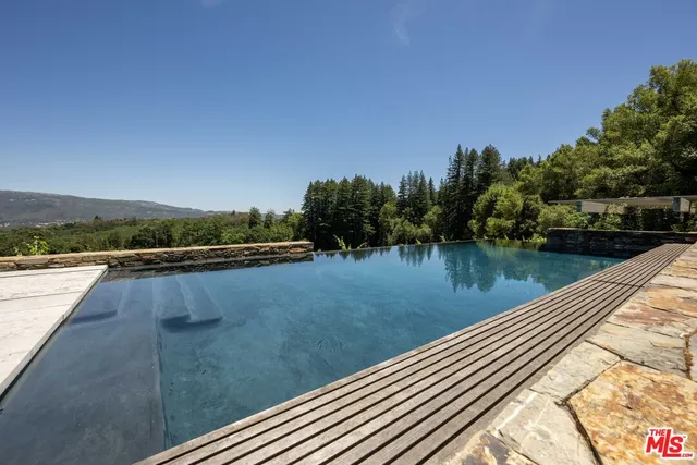 a view of sitting area with lake view