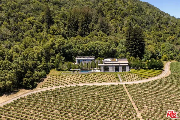 a view of a road with a yard