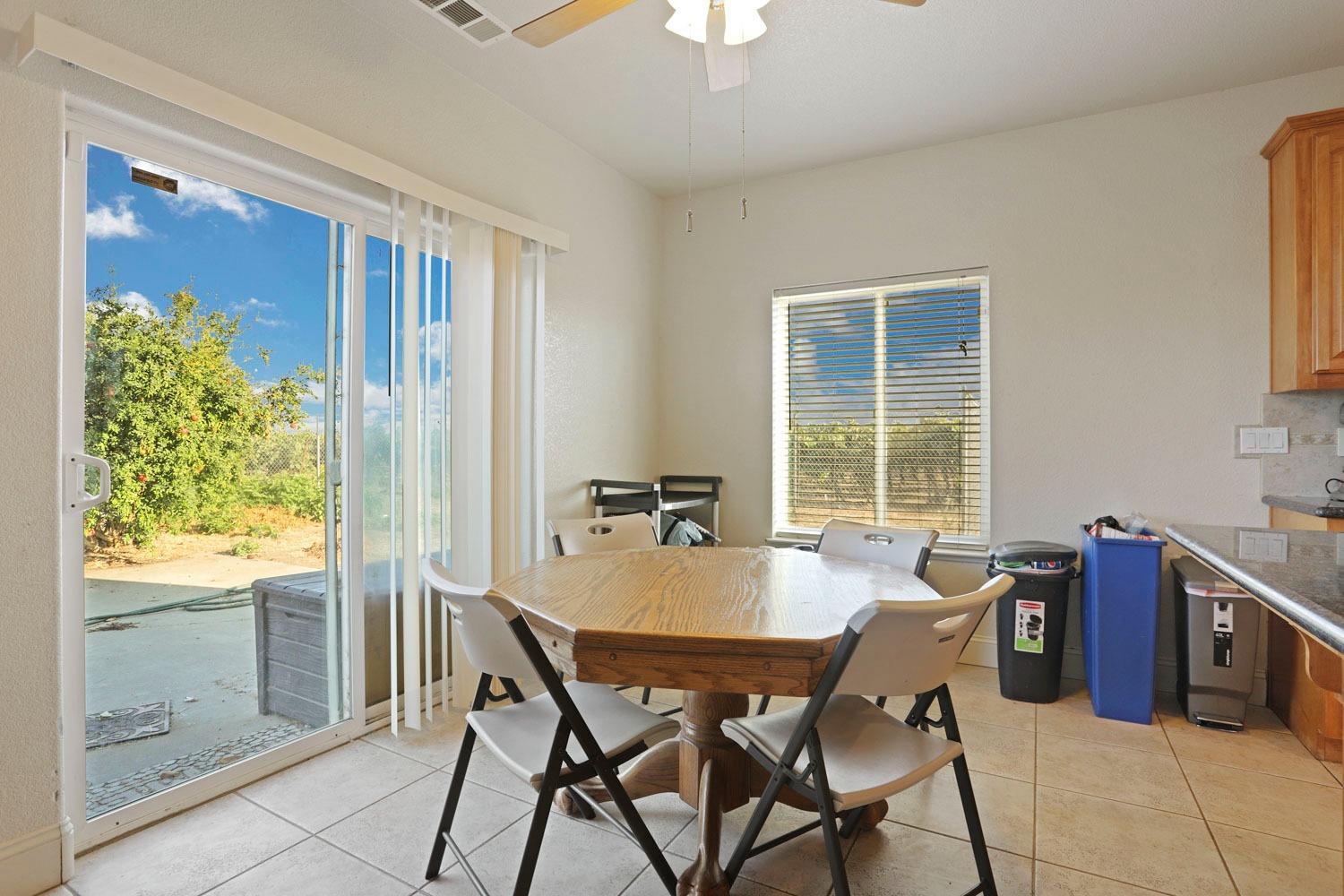 16160 Moore Road Lodi, CA 95242 - Photo 6 of 38 a dining room with furniture and window