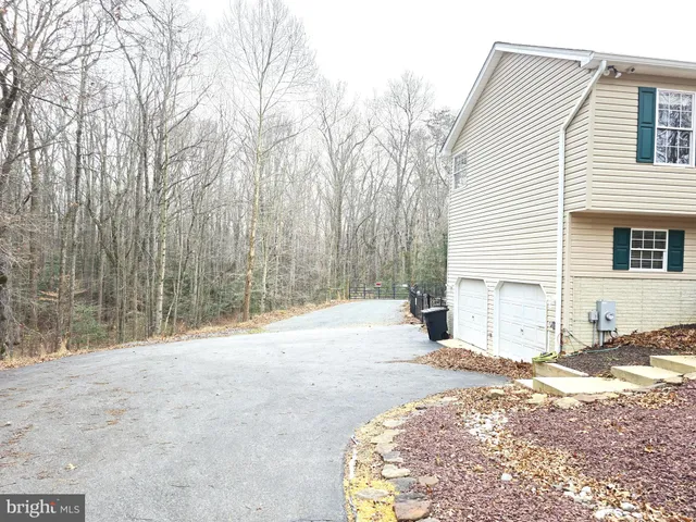 a view of a chairs and table in a room