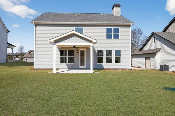 front view of a house with a yard