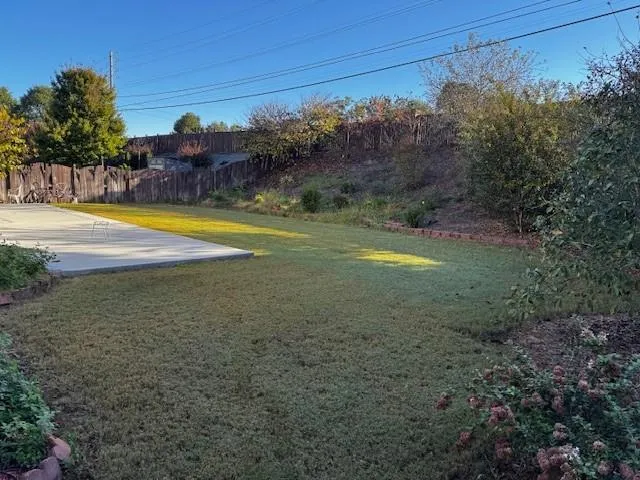 a view of a yard with an outdoor space