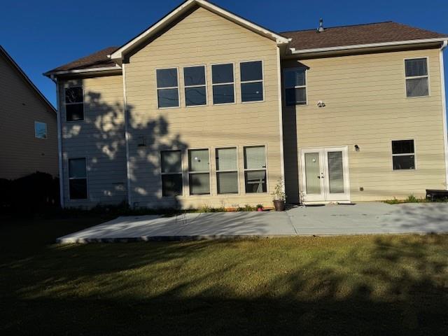 1440 A Waverly Glen Drive Alpharetta, GA 30004 - Photo 27 of 28 a front view of a house with a garden
