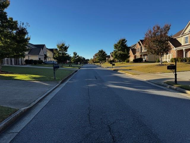 1440 A Waverly Glen Drive Alpharetta, GA 30004 - Photo 3 of 28 a view of a swimming pool with a yard
