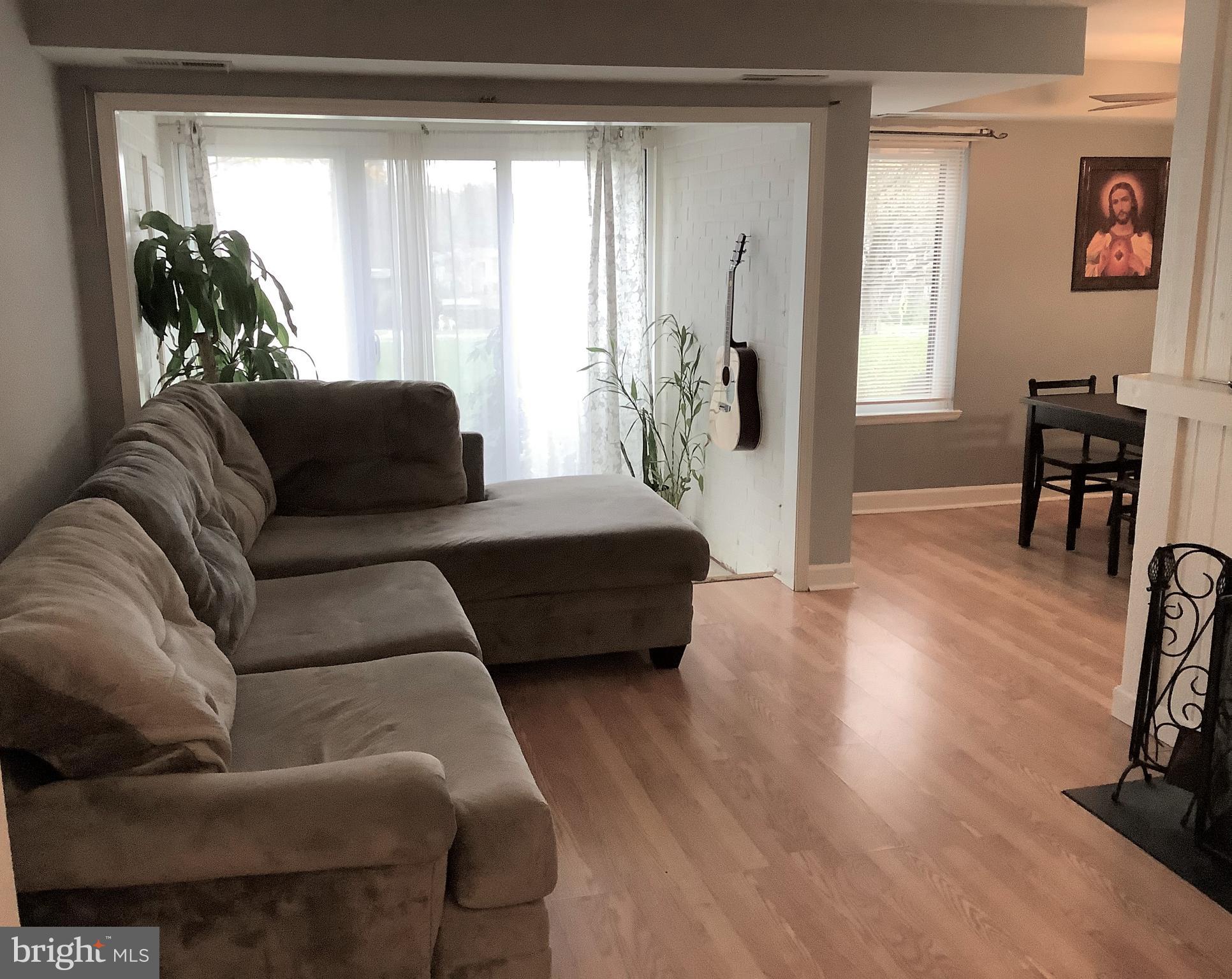 10578 Cross Fox Lane, Unit A1 Columbia, MD 21044 - Photo 2 of 15 Spacious Living Room w/Fireplace