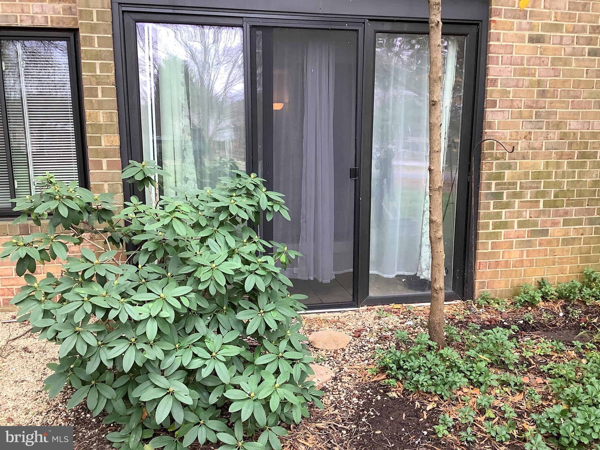 10578 Cross Fox Lane, Unit A1 Columbia, MD 21044 - Photo 15 of 15 Exterior View to Sunroom