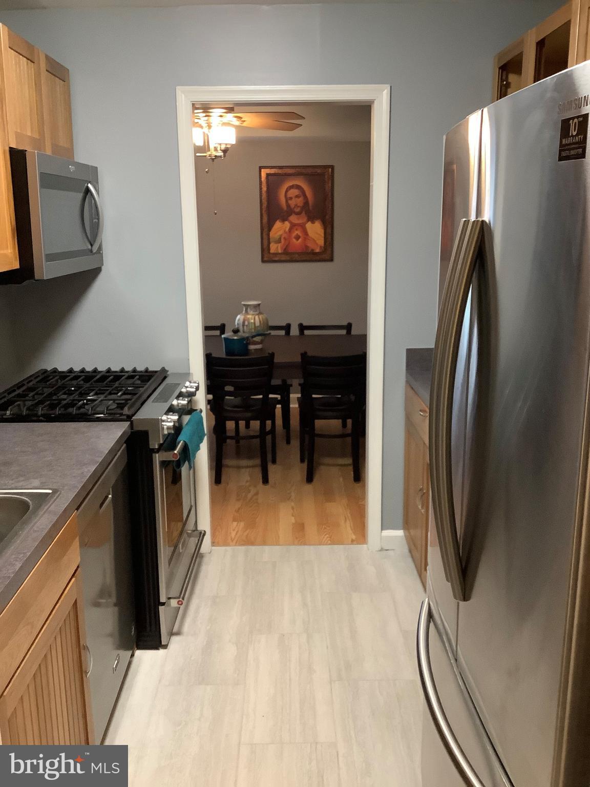 10578 Cross Fox Lane, Unit A1 Columbia, MD 21044 - Photo 7 of 15 Kitchen View from Entrance Foyer