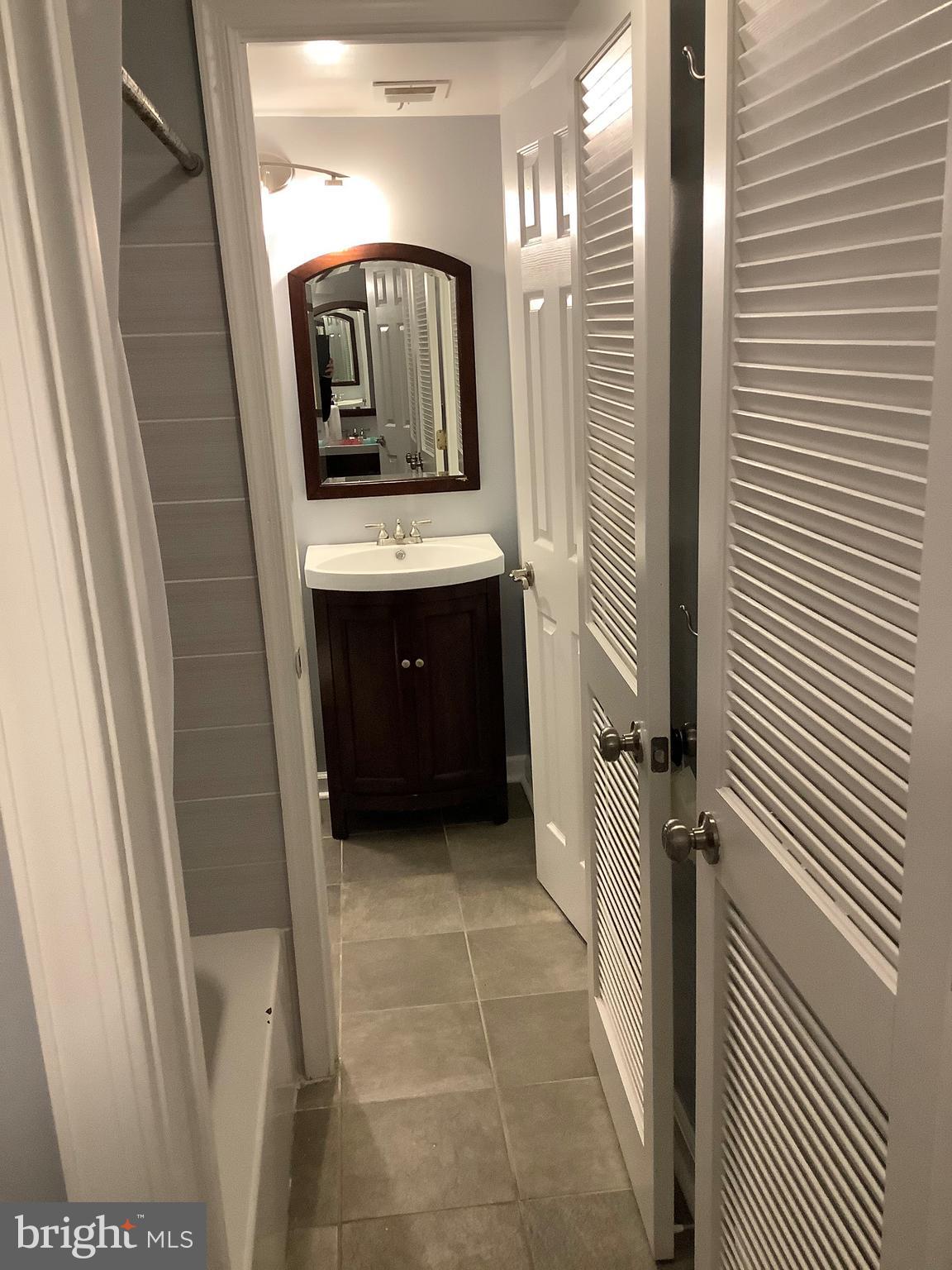 10578 Cross Fox Lane, Unit A1 Columbia, MD 21044 - Photo 8 of 15 Bathroom View from adjoining half bath