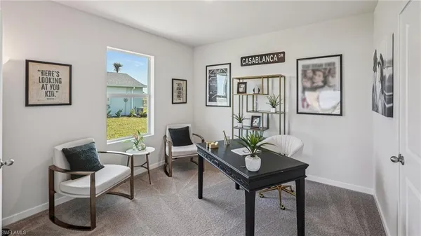 a living room with furniture and a table