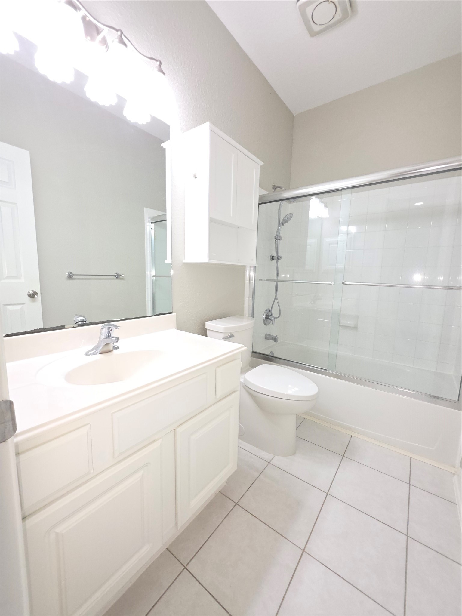 9603 Edgeloch Drive Spring, TX 77379 - Photo 12 of 16 a bathroom with a sink a toilet and shower