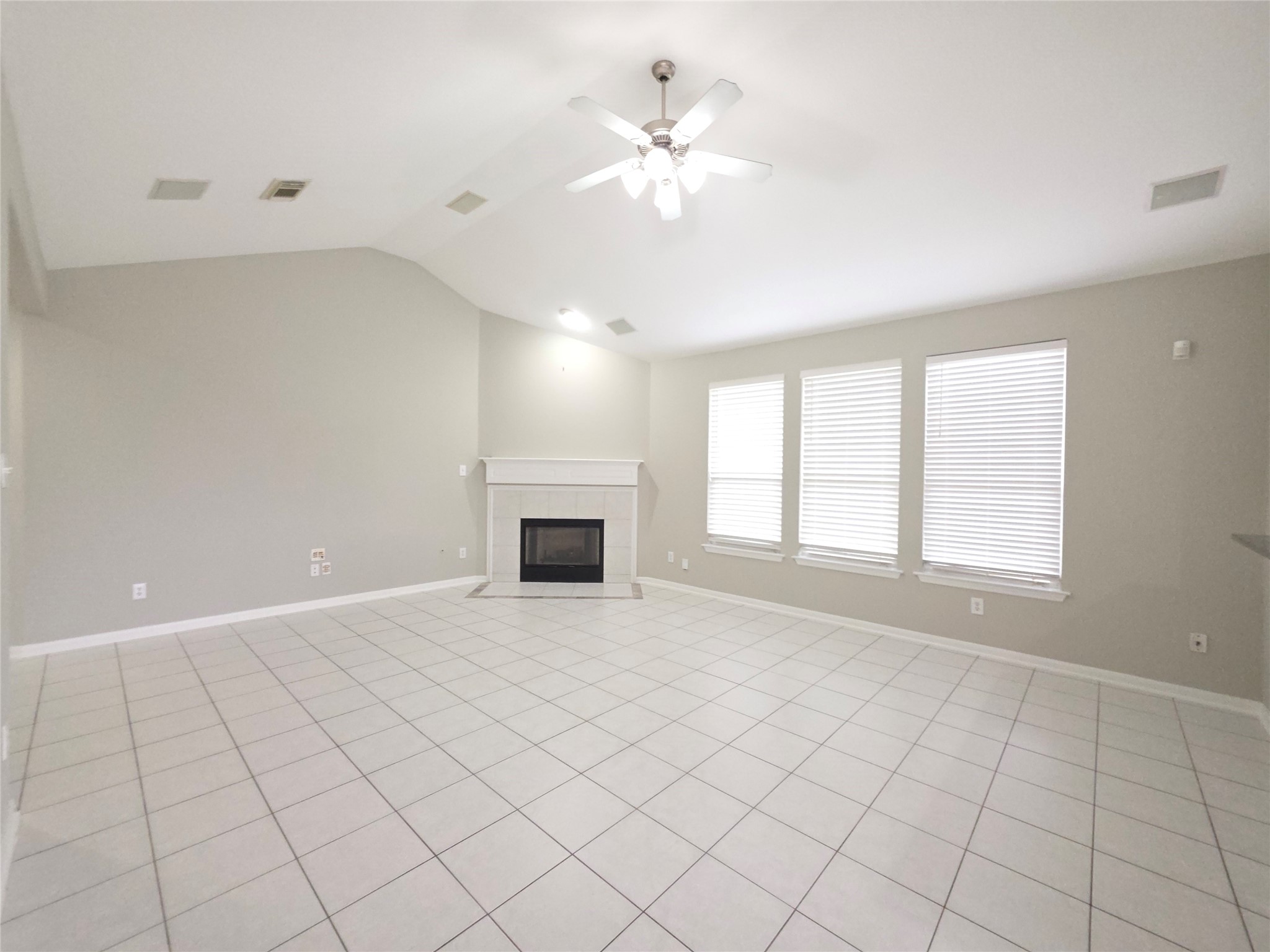 9603 Edgeloch Drive Spring, TX 77379 - Photo 4 of 16 a view of an empty room with a window
