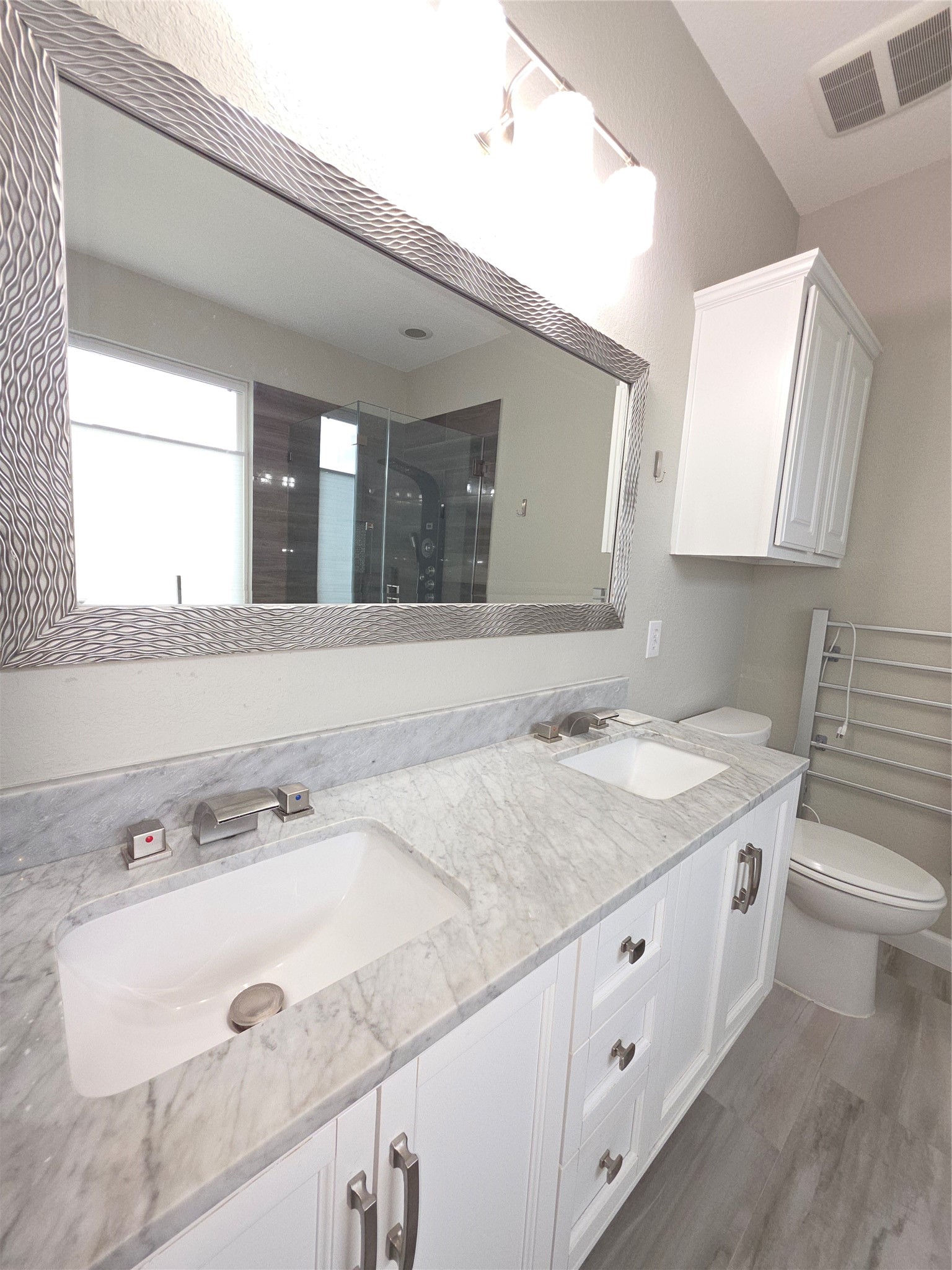 9603 Edgeloch Drive Spring, TX 77379 - Photo 7 of 16 a bathroom with a sink and a mirror