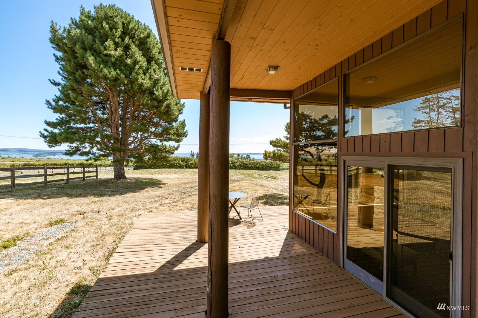 495 East Crescent Harbor Road Oak Harbor, WA 98277 - Photo 32 of 40 a view of outdoor space with wooden floor and city view