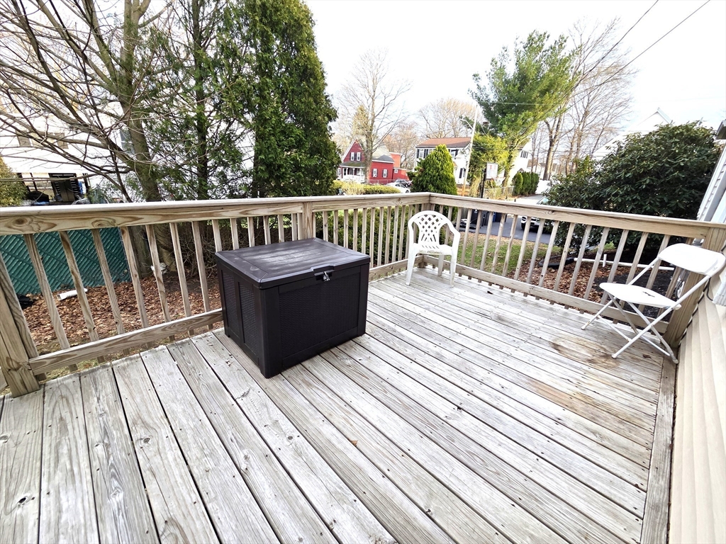 69 Pratt Street, Unit 1 Avon, MA 02322 - Photo 16 of 18 a view of deck with a large trees