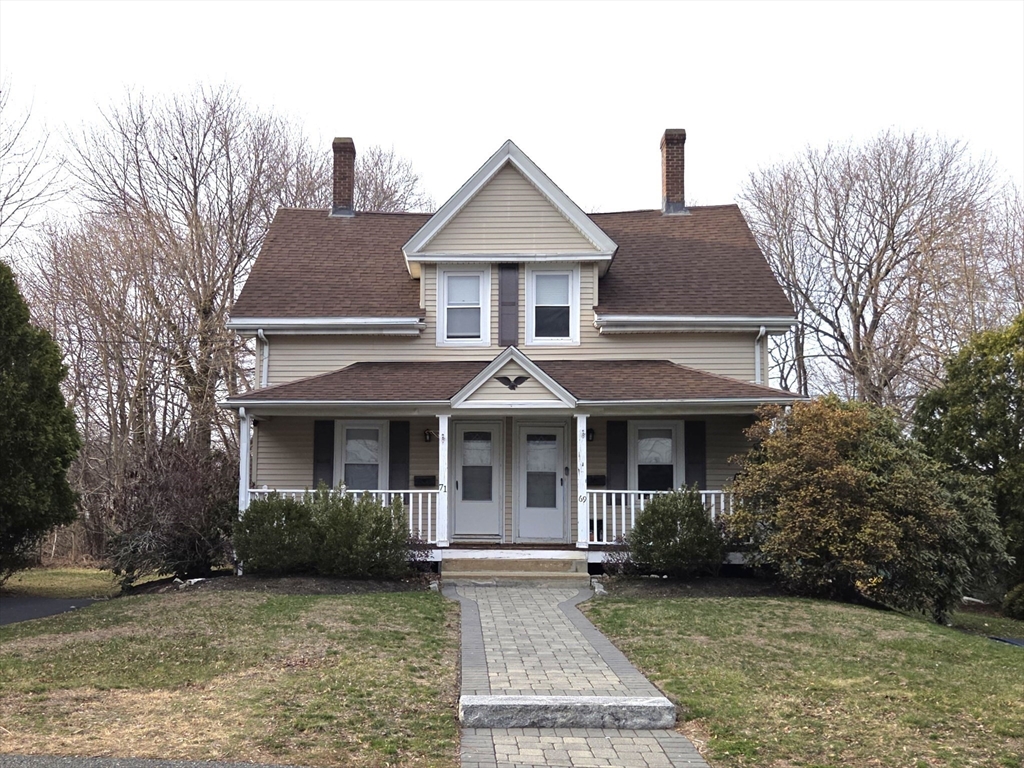 69 Pratt Street, Unit 1 Avon, MA 02322 - Photo 18 of 18 a front view of a house with garden