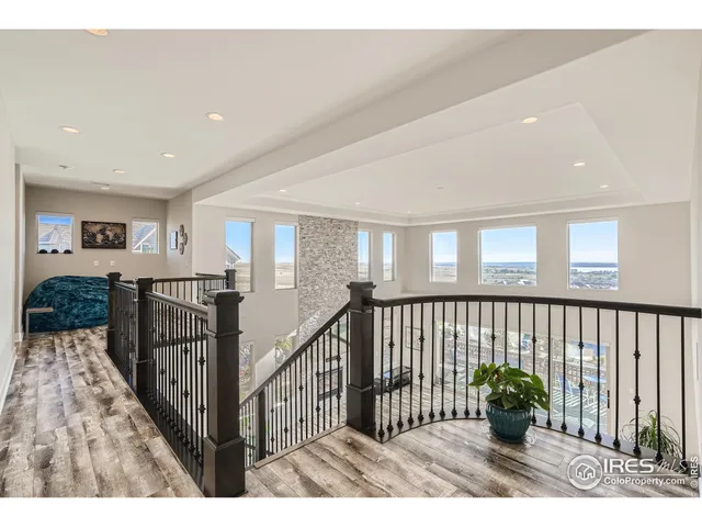 a bedroom with furniture and a fireplace