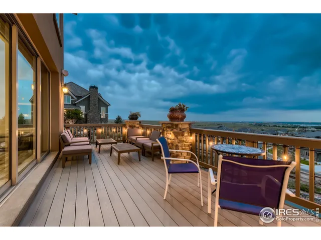 a view of a chairs and table on the terrace