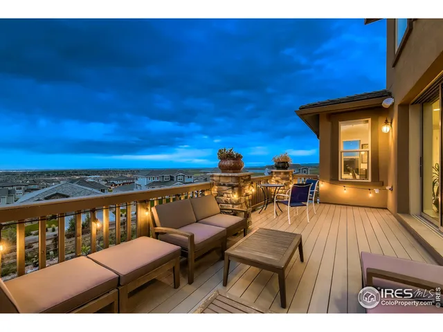 a view of a livingroom with furniture and a table