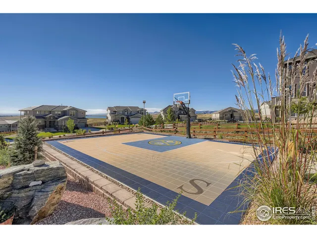 a view of balcony with wooden floor and chair
