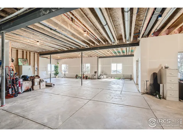 a kitchen with a refrigerator stove and sink