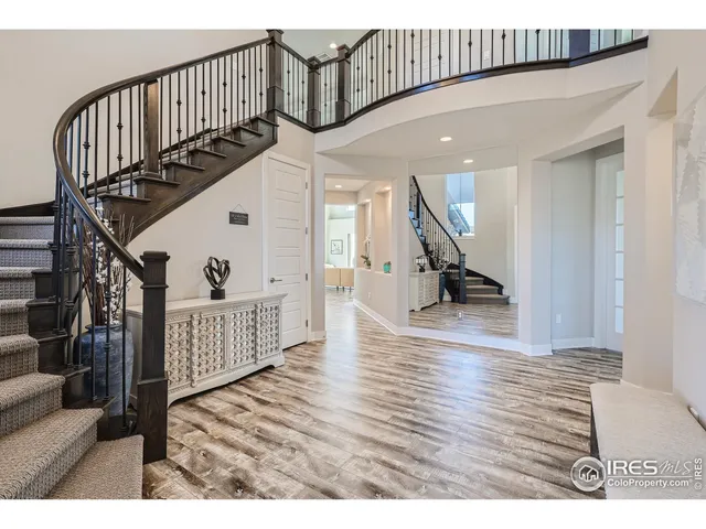 a view of entryway with wooden floor