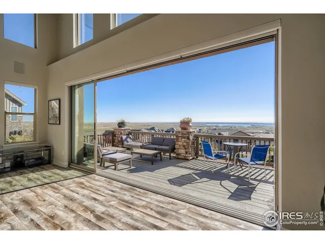 a view of roof deck with seating space