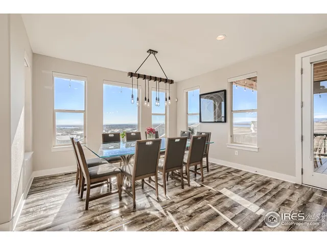 a open kitchen with a table and chairs