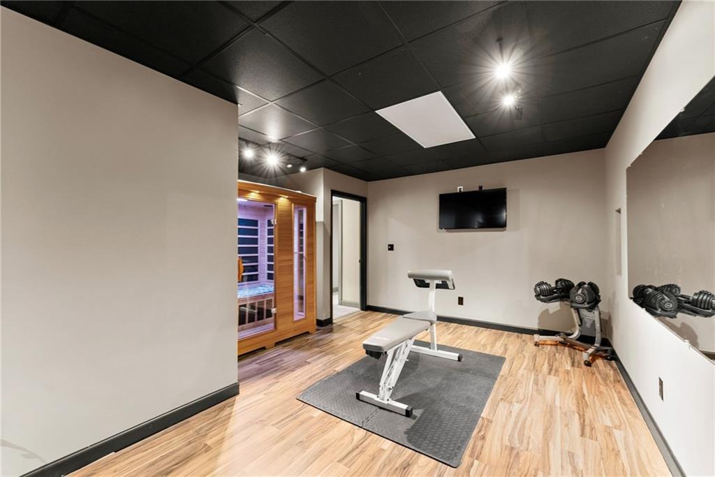 4529 Montclair Circle Gainesville, GA 30506 - Photo 18 of 35 a room with furniture and a flat screen tv