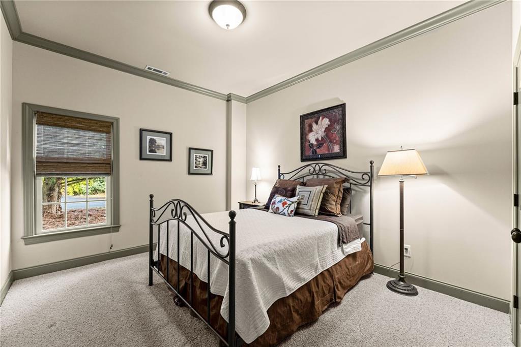 4529 Montclair Circle Gainesville, GA 30506 - Photo 19 of 35 a bedroom with bed and a window