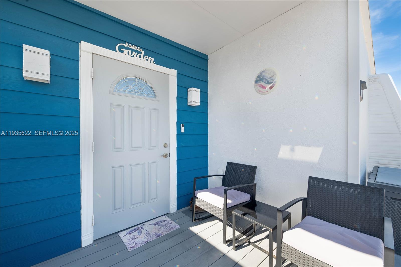1361 Overseas Highway, Unit E11 Marathon, FL 33050 - Photo 22 of 29 a view of a workspace with furniture and wooden floor