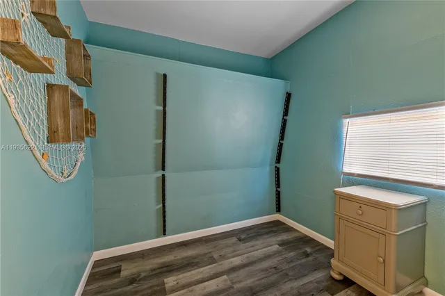 a view of a room with racks on the wall