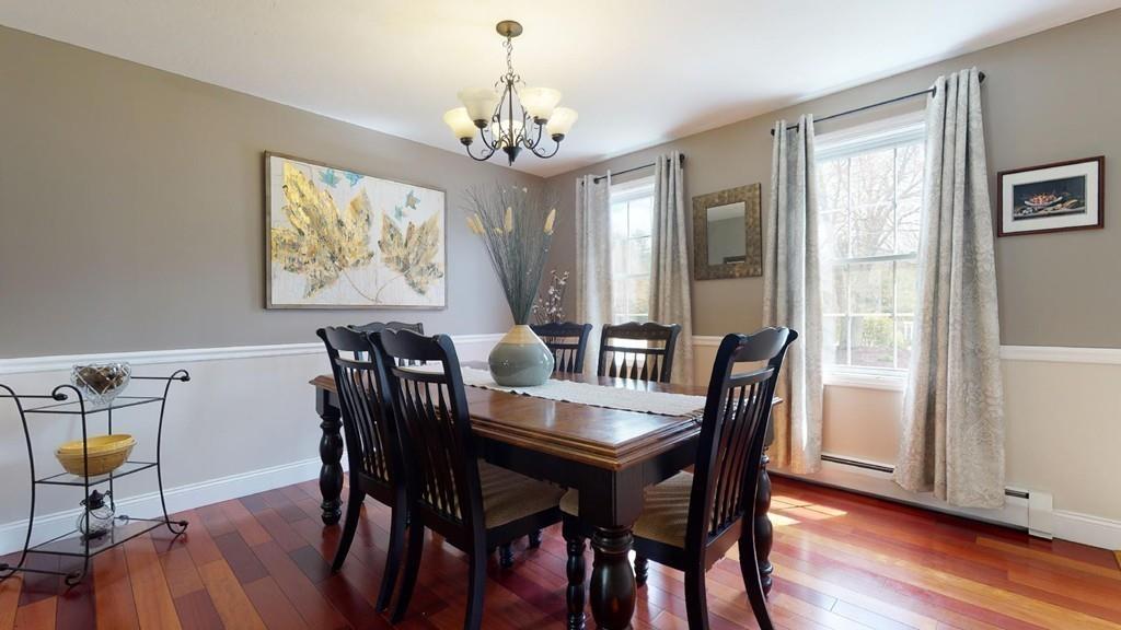98 Haggerty Road Charlton, MA 01507 - Photo 13 of 42 a view of a dining room with furniture window and wooden floor