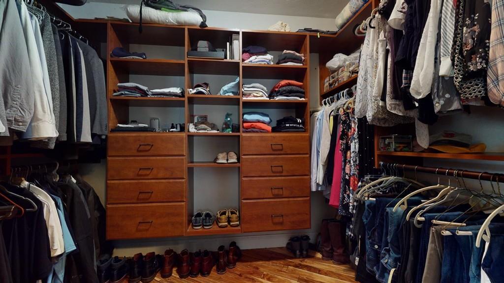 98 Haggerty Road Charlton, MA 01507 - Photo 16 of 42 a view of walk in closet with clothes and shoes