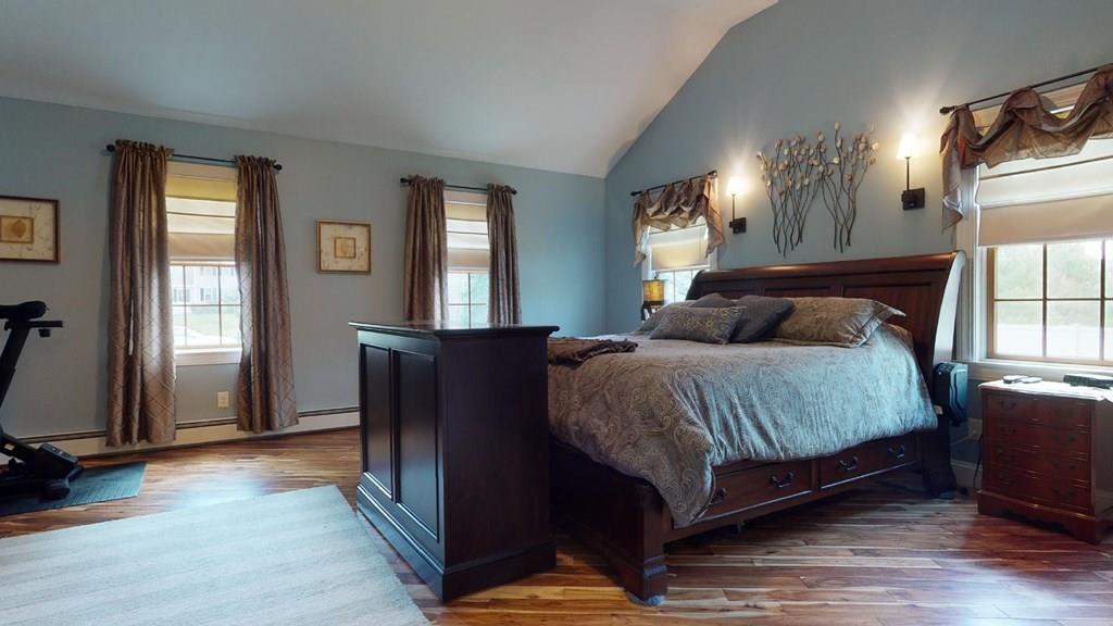 98 Haggerty Road Charlton, MA 01507 - Photo 19 of 42 a bedroom with a bed and window