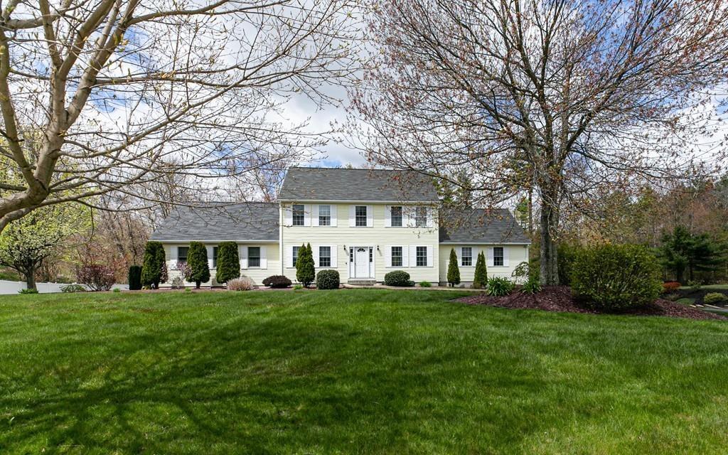 98 Haggerty Road Charlton, MA 01507 - Photo 2 of 42 a front view of a house with a garden