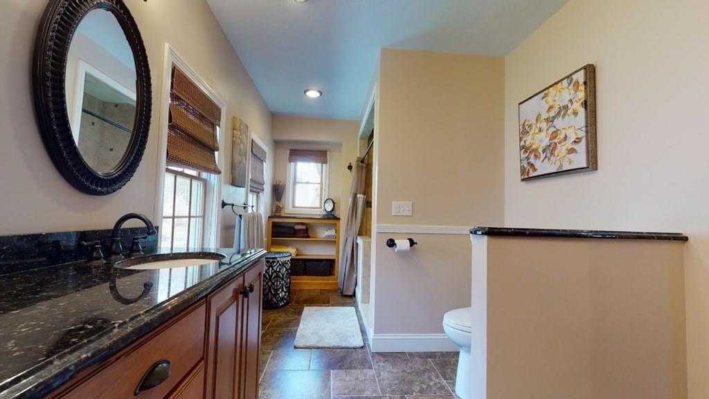 98 Haggerty Road Charlton, MA 01507 - Photo 21 of 42 a bathroom with a sink and a mirror