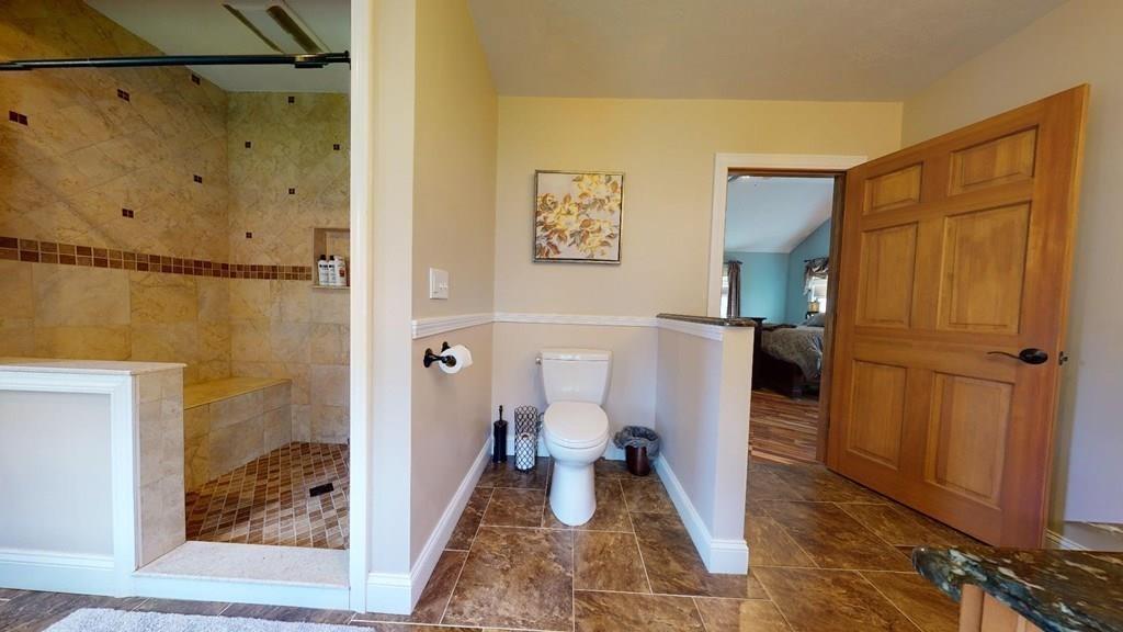 98 Haggerty Road Charlton, MA 01507 - Photo 22 of 42 a bathroom with a toilet and a shower