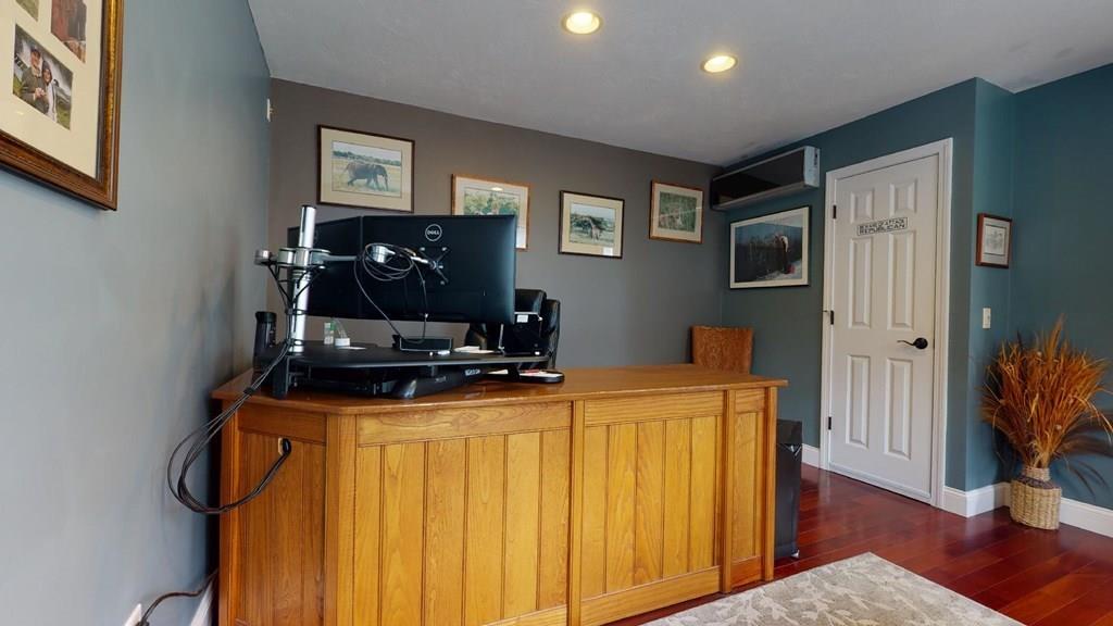 98 Haggerty Road Charlton, MA 01507 - Photo 24 of 42 a view of a workspace with furniture and wooden floor