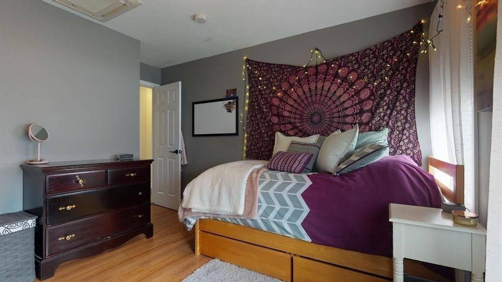 98 Haggerty Road Charlton, MA 01507 - Photo 26 of 42 a bedroom with a bed and a dresser