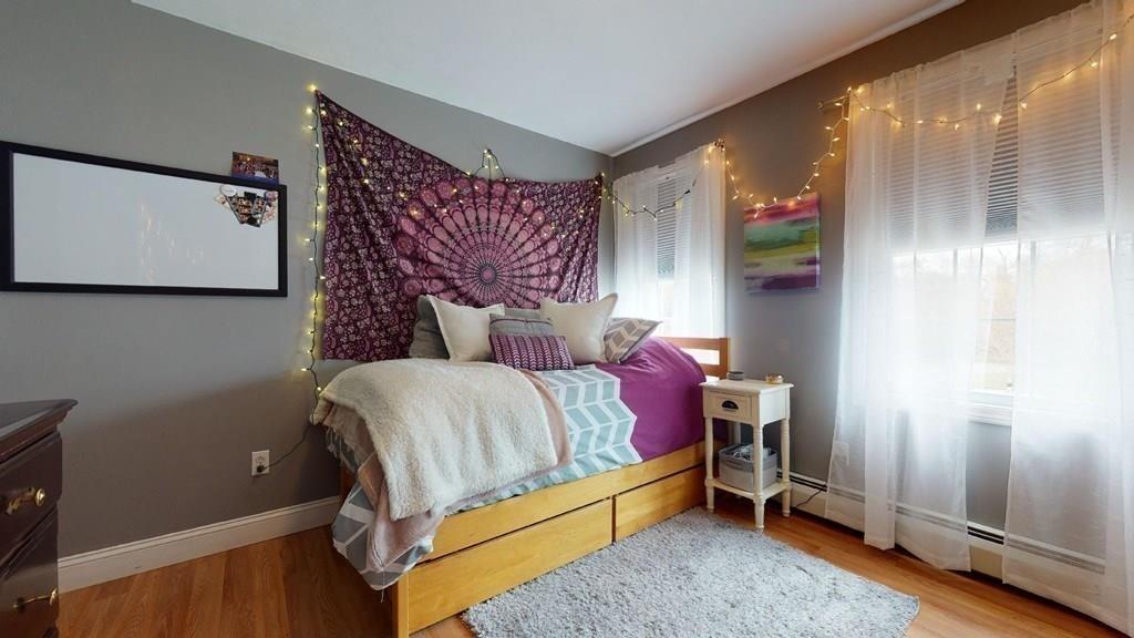 98 Haggerty Road Charlton, MA 01507 - Photo 27 of 42 a bed room with a bed and a window
