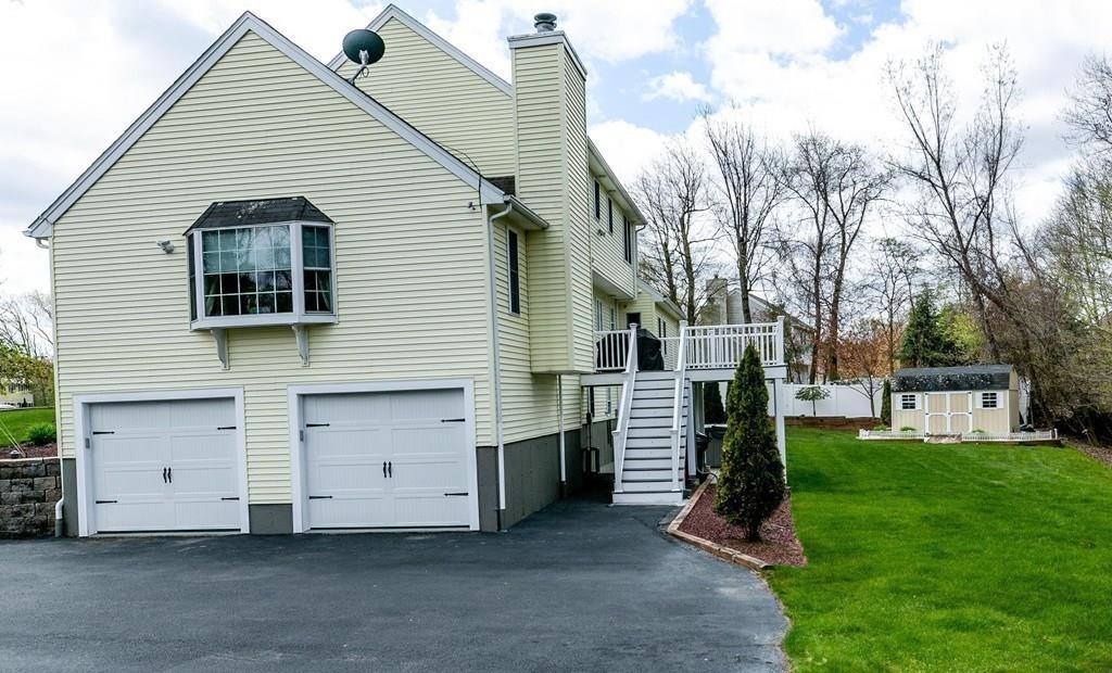 98 Haggerty Road Charlton, MA 01507 - Photo 41 of 42 a view of a house with a yard