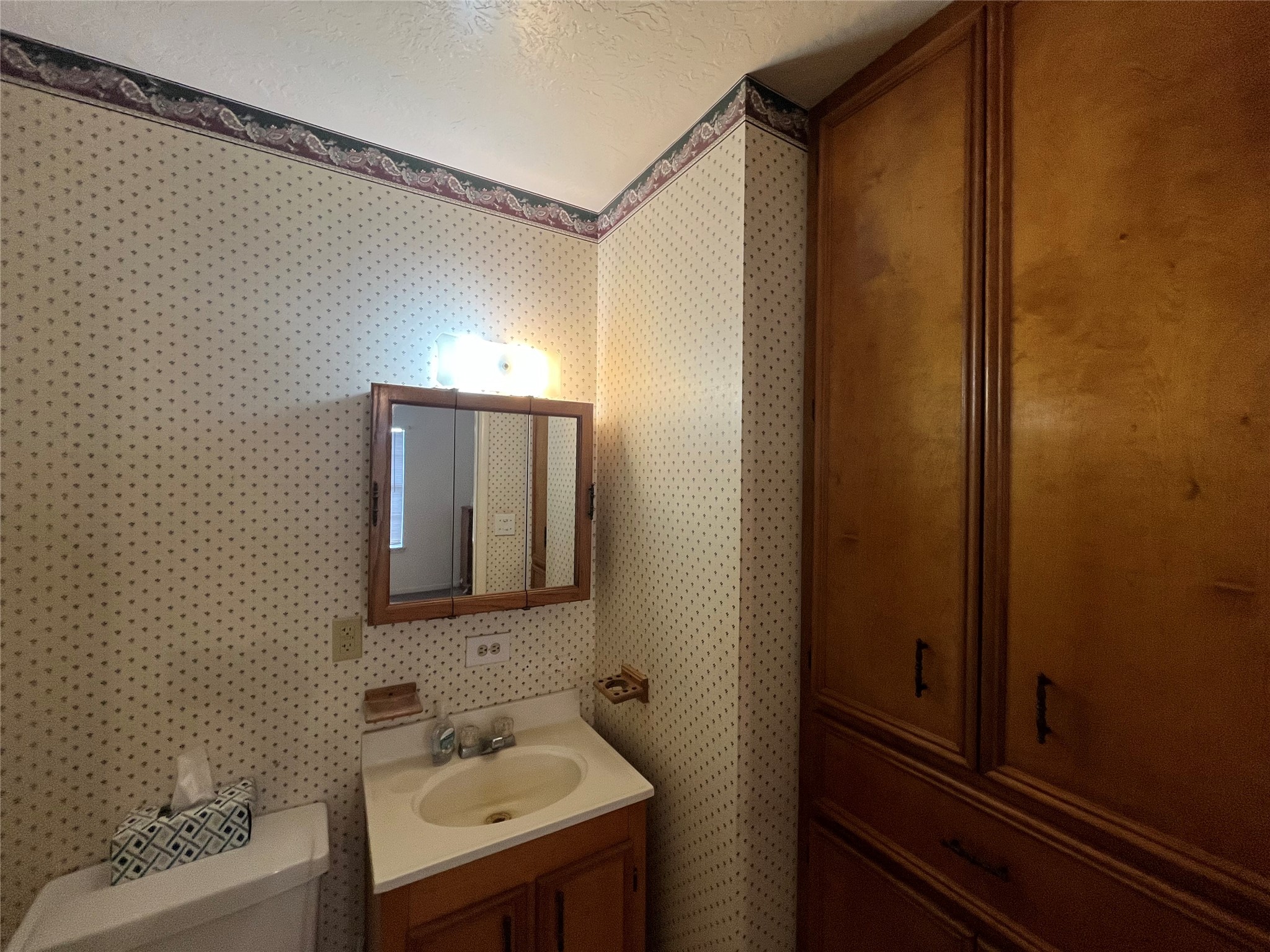 1475 Cr 16 Road Garwood, TX 77442 - Photo 31 of 43 a bathroom with a sink and a mirror