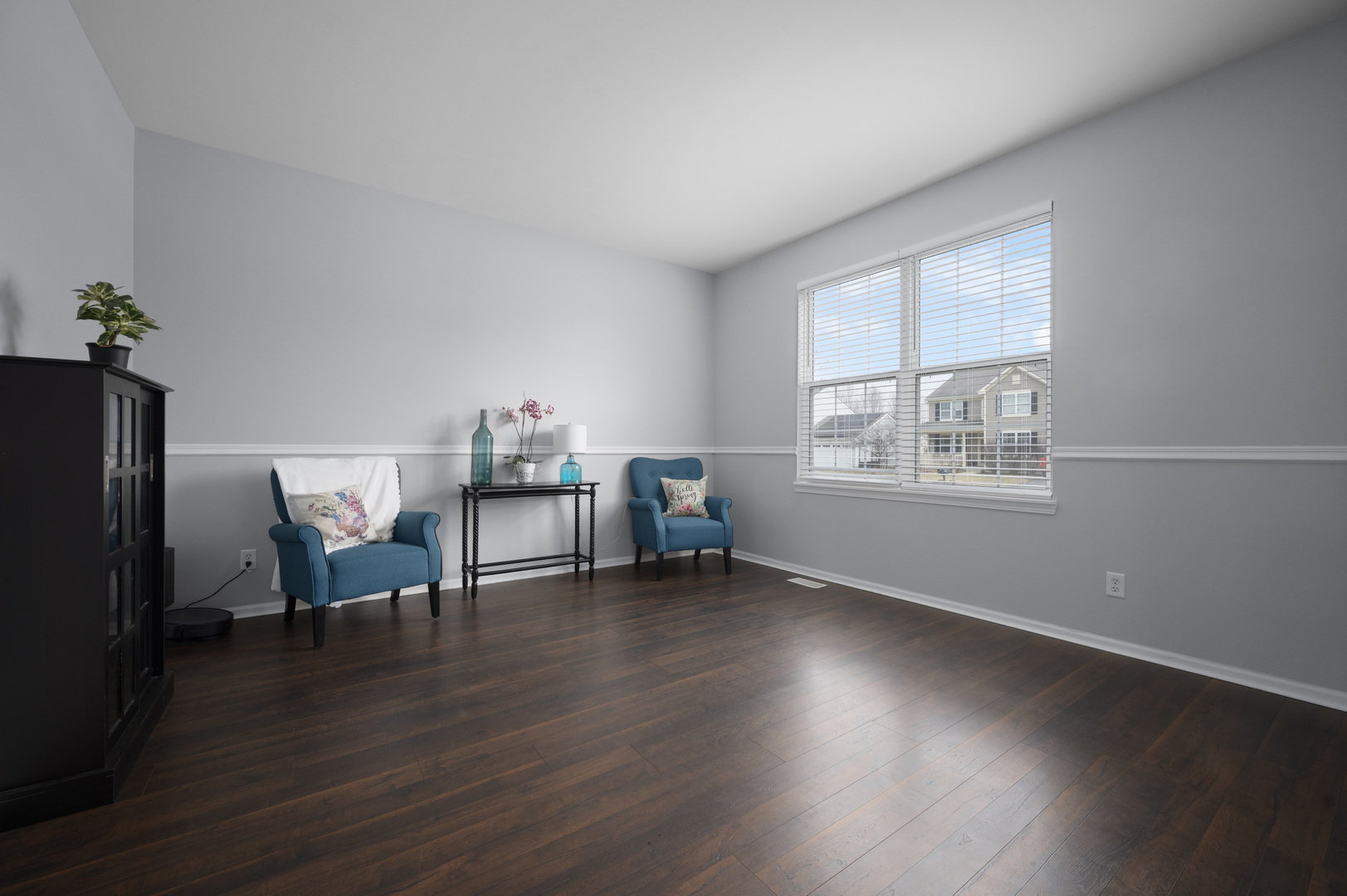 419 Riverbend Drive Genoa, IL 60135 - Photo 2 of 42 a view of a livingroom with furniture and wooden floor