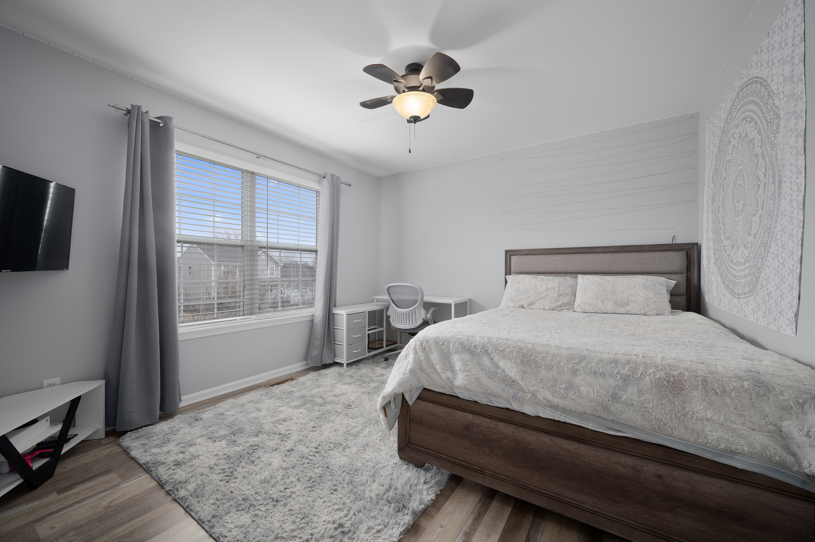 419 Riverbend Drive Genoa, IL 60135 - Photo 22 of 42 a bedroom with a bed and a window