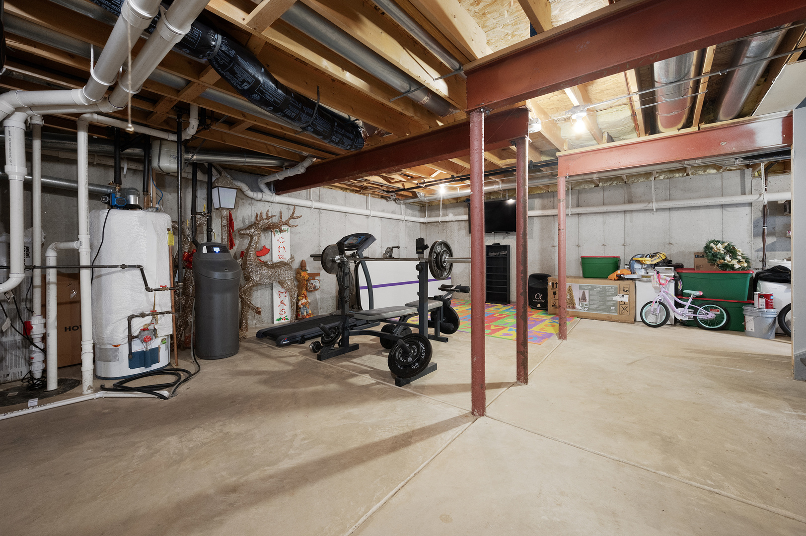 419 Riverbend Drive Genoa, IL 60135 - Photo 27 of 42 a view of a garage with rack and bicycle