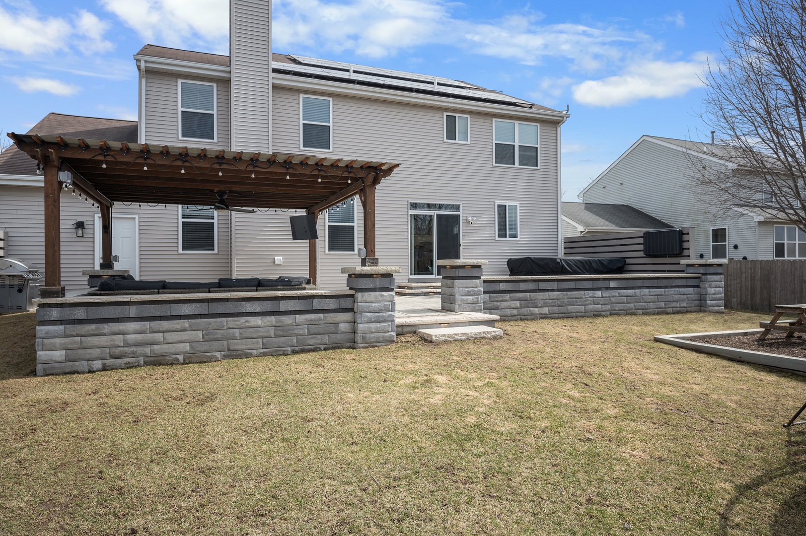 419 Riverbend Drive Genoa, IL 60135 - Photo 29 of 42 a view of a house with backyard and a tree