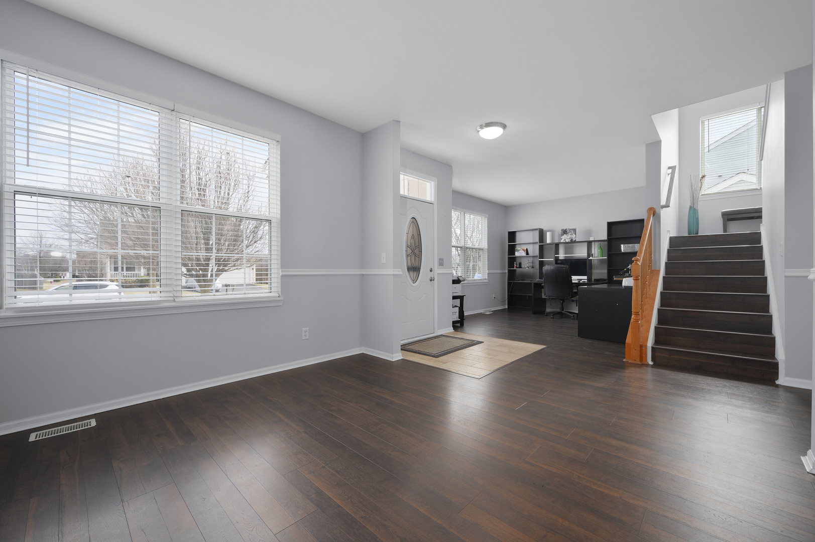419 Riverbend Drive Genoa, IL 60135 - Photo 3 of 42 a view of empty room with wooden floor