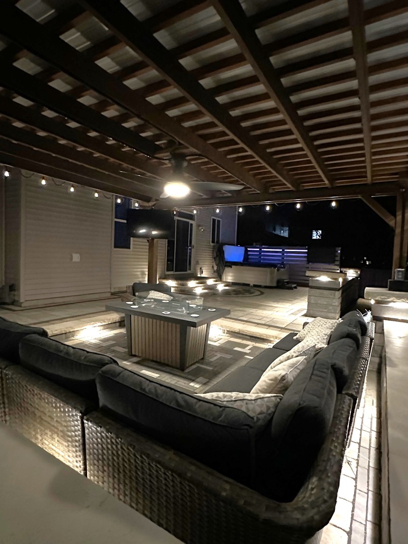 419 Riverbend Drive Genoa, IL 60135 - Photo 34 of 42 a kitchen with stainless steel appliances granite countertop a stove and a sink