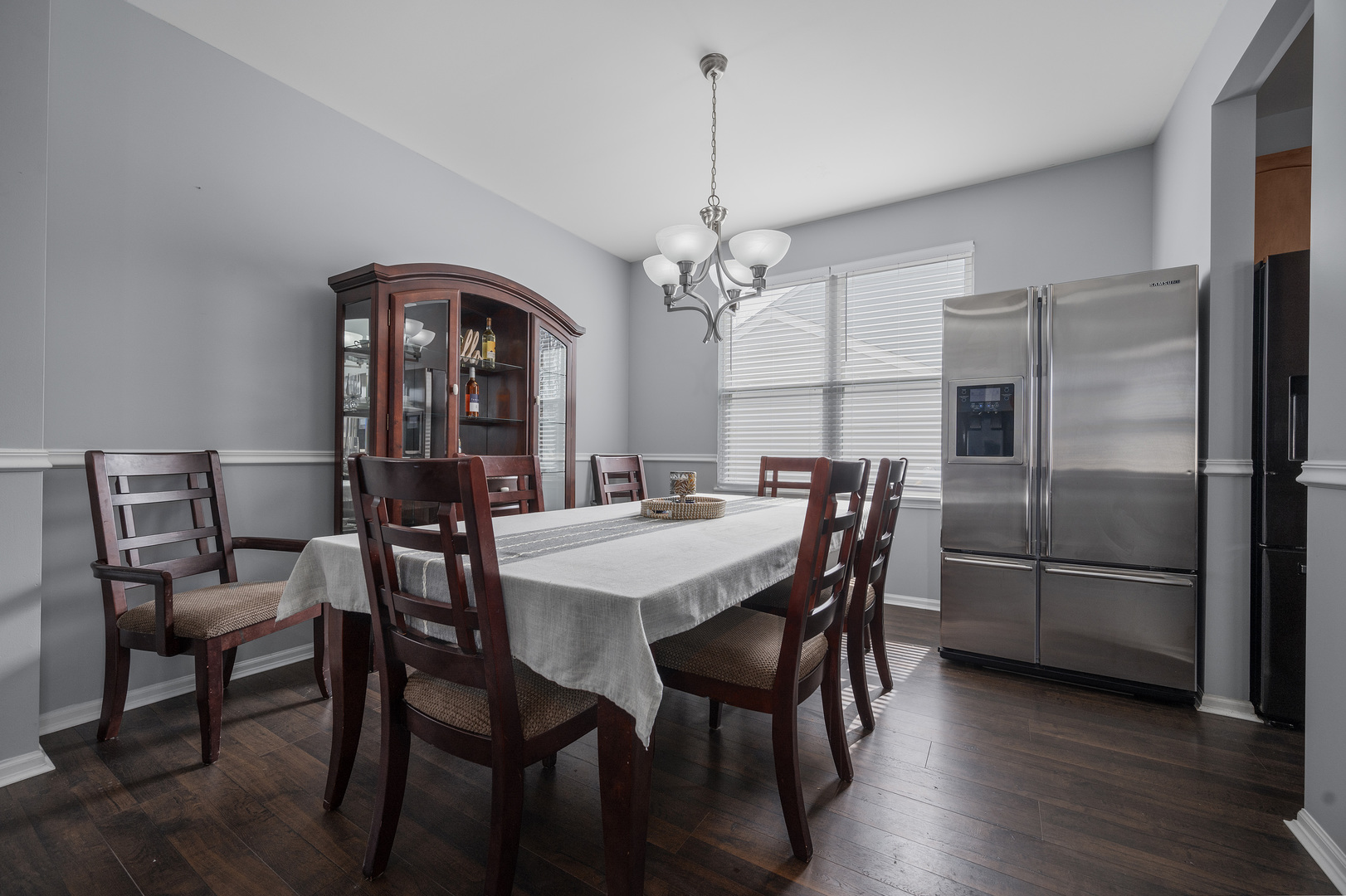 419 Riverbend Drive Genoa, IL 60135 - Photo 6 of 42 a view of a dining room with furniture and wooden floor